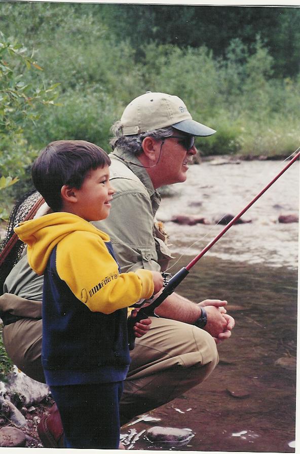 Christopher fishing with family