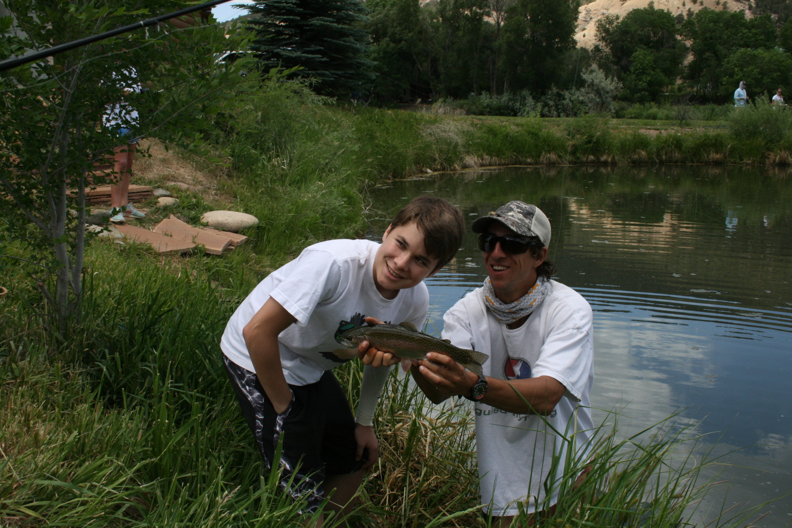 Fasi and Benno - catching fish with Aspen Trout Guides