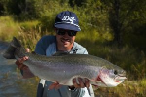 Pierce Klingbiel Aspen Trout Guide with large trout caught in River